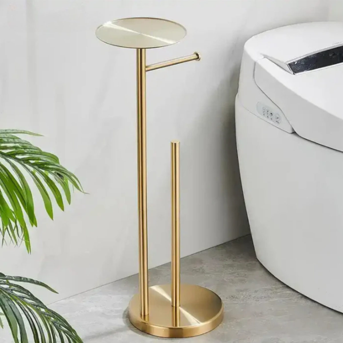 Porta papel higiênico de chão valet em inox dourado da Homedeccori para banheiro luxuoso
