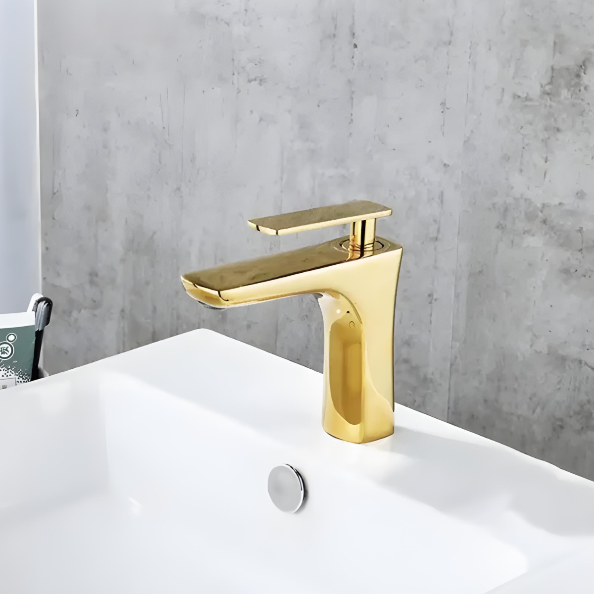 Torneira para banheiro monocomando Palazzo em dourado com design moderno instalada em cuba branca